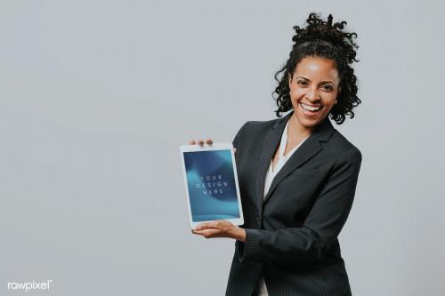 Happy businesswoman with a digital tablet - 2020018