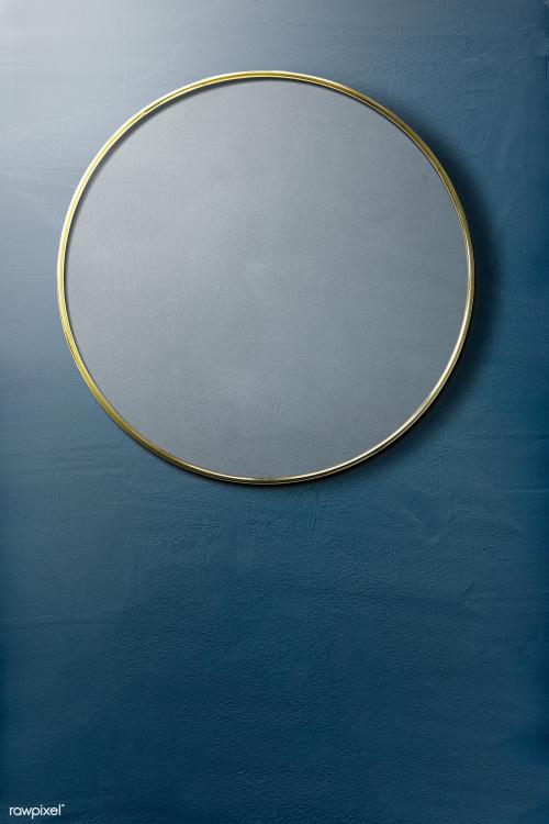 Gold framed mirror on a blue wall mockup - 2036825