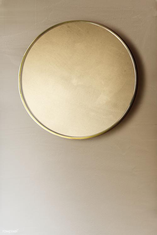 Gold framed mirror on a brown wall mockup - 2036830