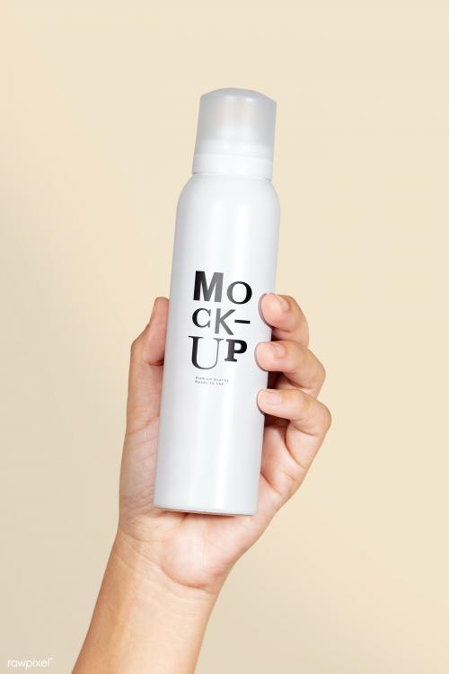 Black woman holding a white spray bottle psd mockup - 2051870