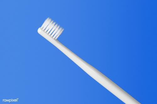 Gray toothbrush on a blue background - 2053015