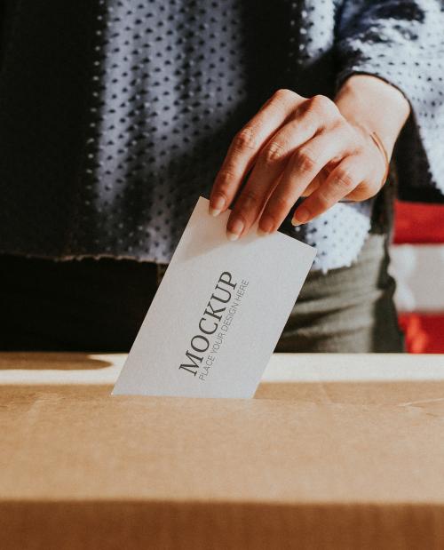 American casting her vote to a ballot box mockup - 1223820