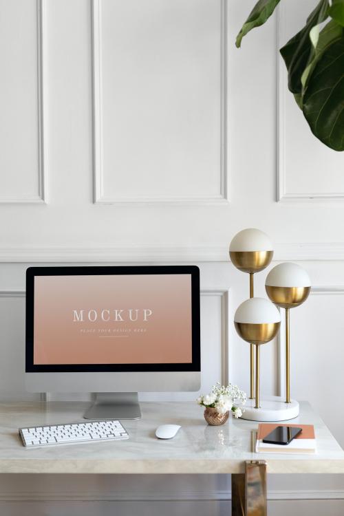 Computer screen mockup by a golden lamp - 1224350