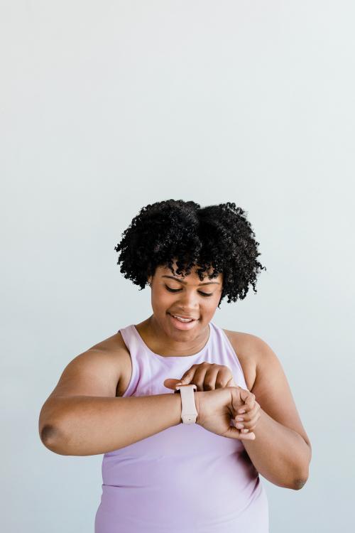 Black young woman using a smartwatch mockup - 1225102