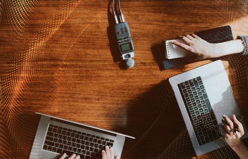 Portable sound recorder on a wooden table - 1225686