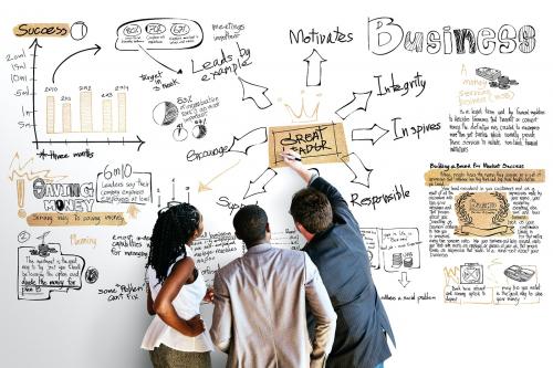 Business people writing on a whiteboard mockup - 1226845