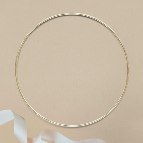 Round gold frame on beige background - 1204193