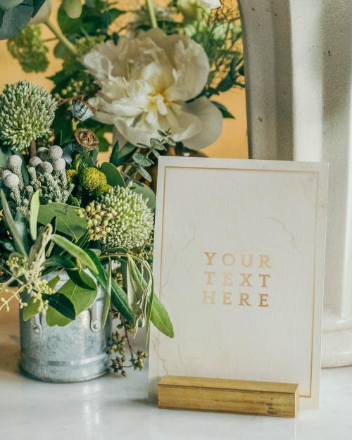 Bucket of fresh flowers with a card mockup - 1209270