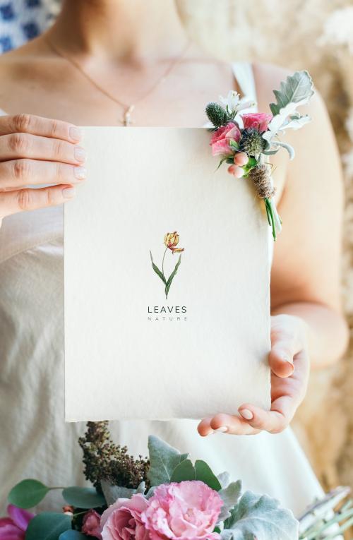 Bride holding a floral card mockup - 1209929