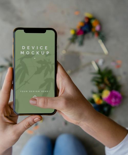 Woman using a mobile screen mockup - 1210200