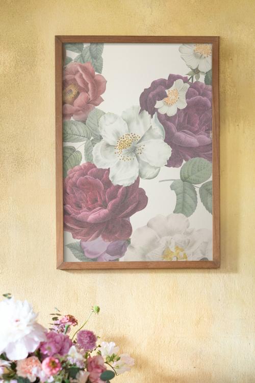 Floral frame mockup on a grunge yellow wall - 1212391