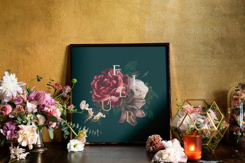 Floral frame mockup by the yellow wall - 1212429