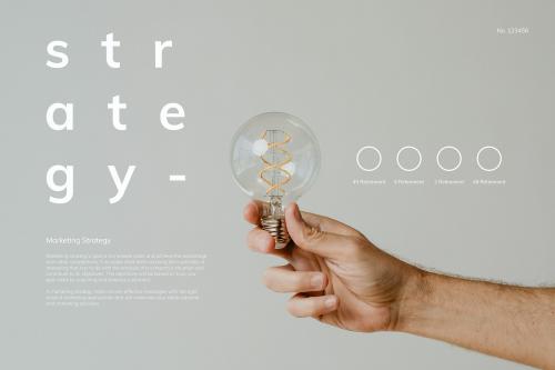 Hand holding a light bulb mockup - 1213897