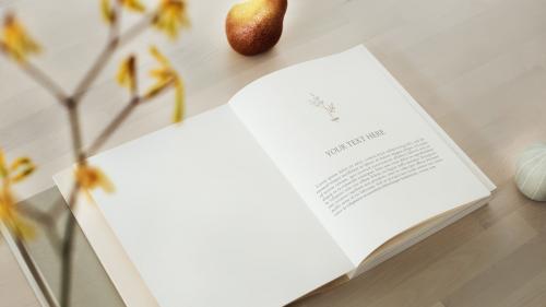 Opened book mockup on a wooden table - 1215244