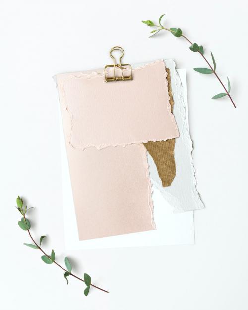 Blank torn pink paper templates set with a paperclip - 1201835