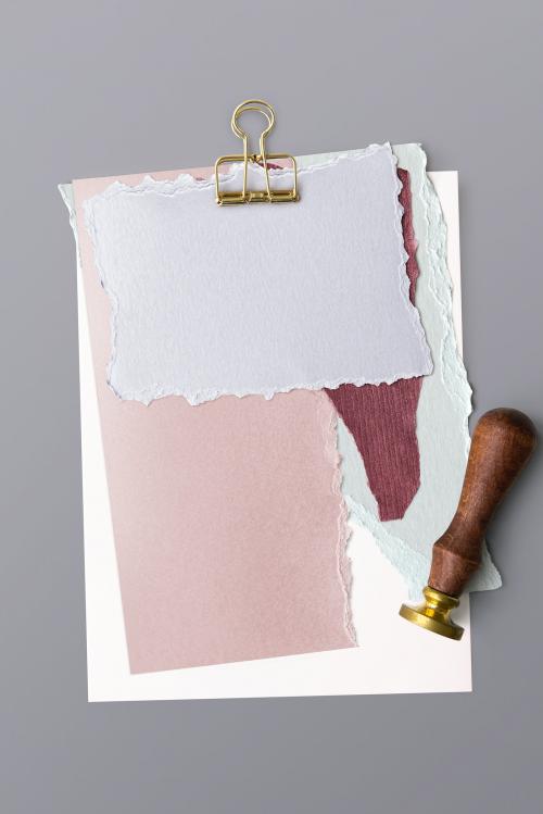 Blank torn pink paper templates set with a paperclip - 1201910