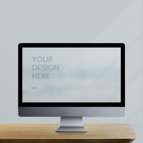 Desktop computer with screen mockup on a wooden table illustration - 935104