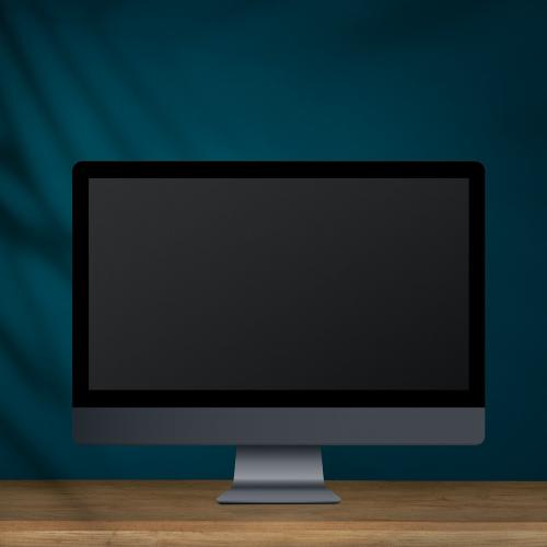 Desktop computer with screen mockup on a wooden table illustration - 935128