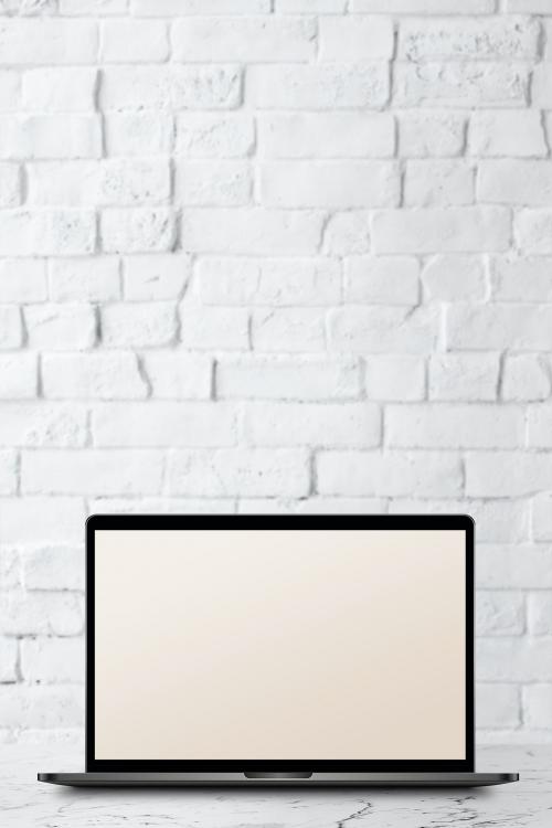 Laptop with screen mockup on a white marble table - 935163