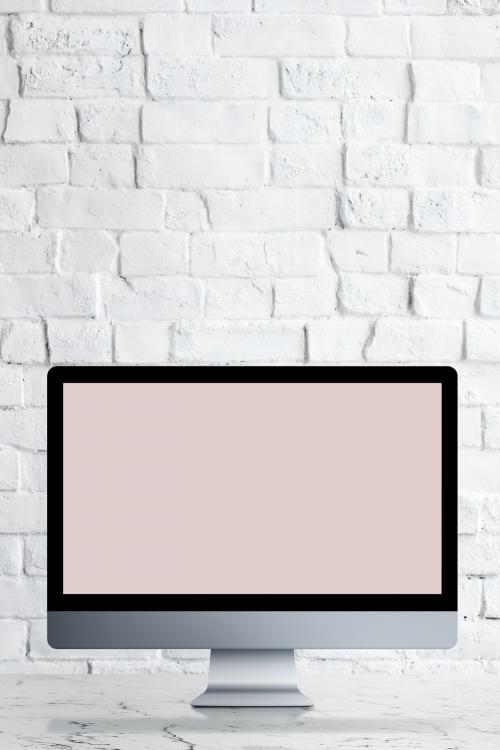 Desktop computer with screen mockup on a white marble table illustration - 935176