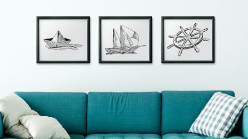 Picture frames hanging on a white brick wall illustration - 935278