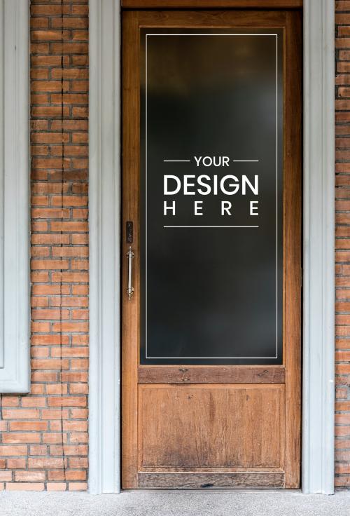 Black board mockup on a wooden door - 844179