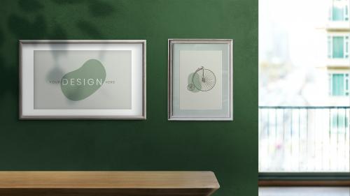 Frames mockup on a green wall - 894269