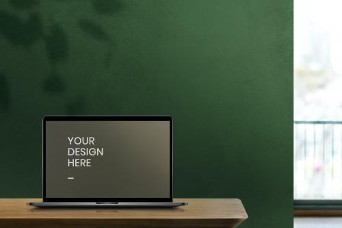 Laptop screen mockup on a wooden table - 894290