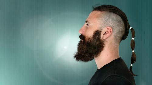 Side view of a bearded man - 894476