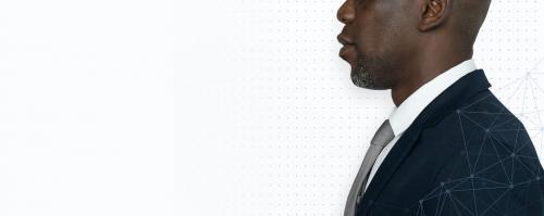 Side view of a thoughtful black businessman - 894658