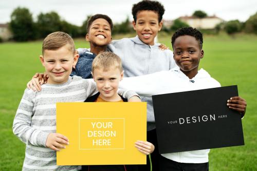 Happy diverse kids holding a sign mockup - 894820