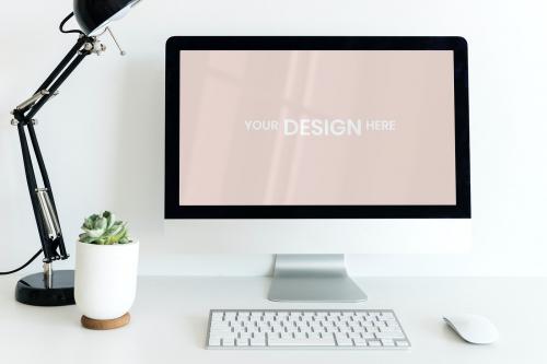 Computer screen mockup in a minimal workspace - 894856