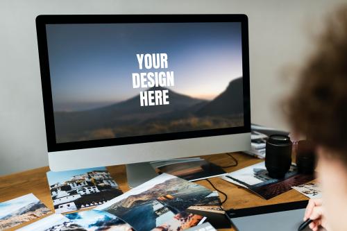 Designer working on a computer screen mockup - 894877