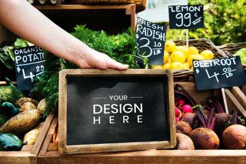Greengrocer advertising organic product on a wooden board mockup - 894879