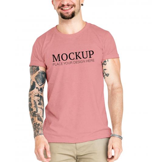 Tattooed man in a nude pink tee mockup - 598472