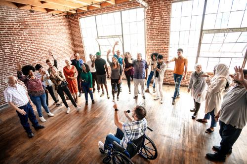 Cheerful diverse people in a workshop - 2027539