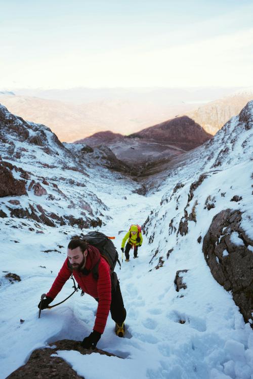 Mountaineers climbing the snowy mountain - 2097851