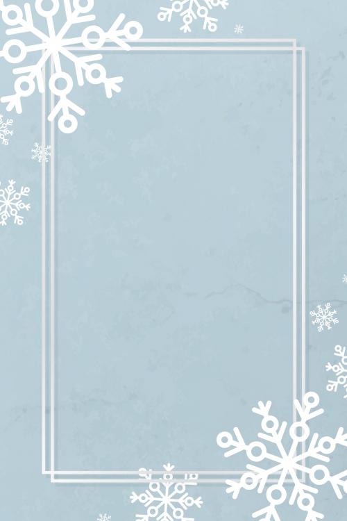 White frame with snowflake patterned on blue background vector - 1227525