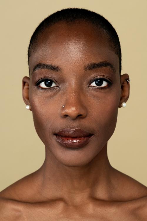 Black woman with a neutral facial expression - 2230106