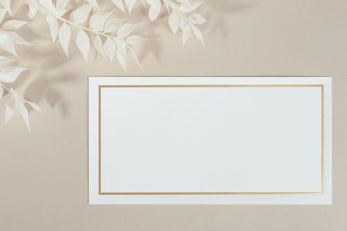 Blank white paper mockup and beige branches - 2258588