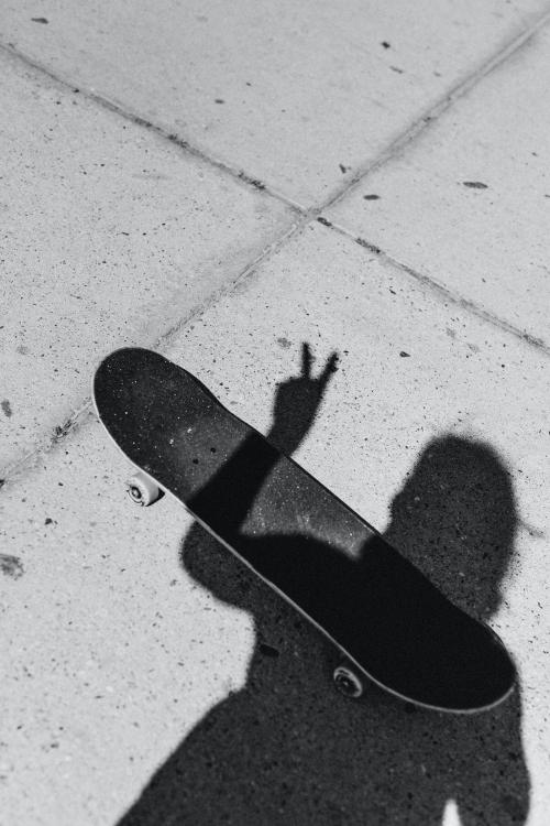 Shadow of a skateboarder on the concrete street - 2268781