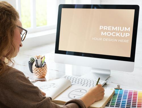 Female designer using a computer mockup - 580877