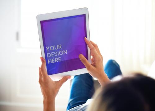 Woman using a digital tablet mockup - 580897