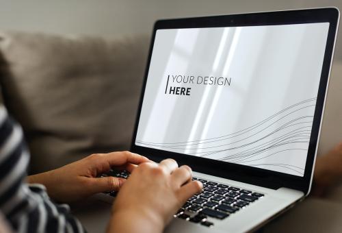 Woman using a laptop mockup - 580899