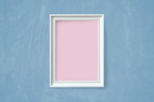 Frame mockup on a blue wall - 585992