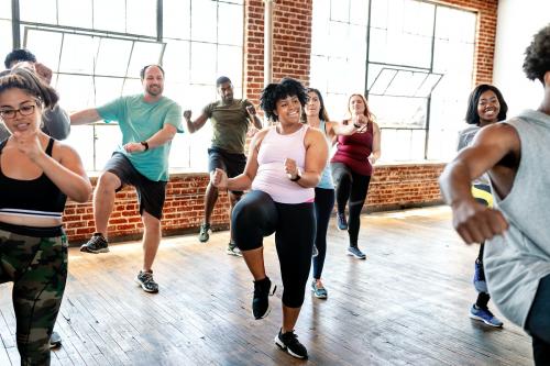 Diverse people in an active dance class - 2046421