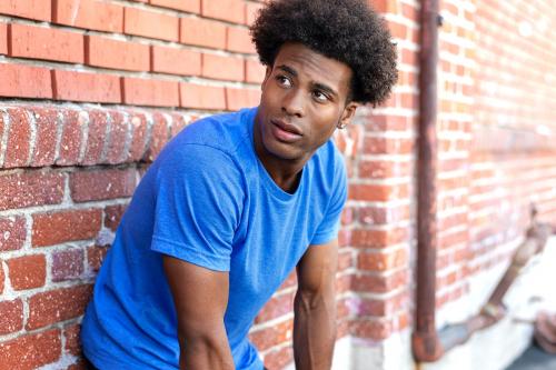 Exhausted man taking a break after a workout - 2046428