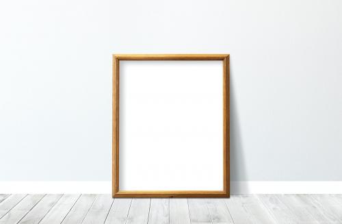 Wooden frame against a gray wall - 586072