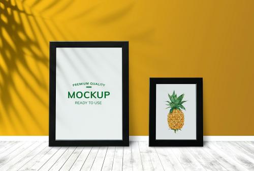 Pineapple in a frame mockup against a yellow wall - 586097