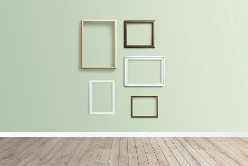 Frame mockups against a green wall - 586121